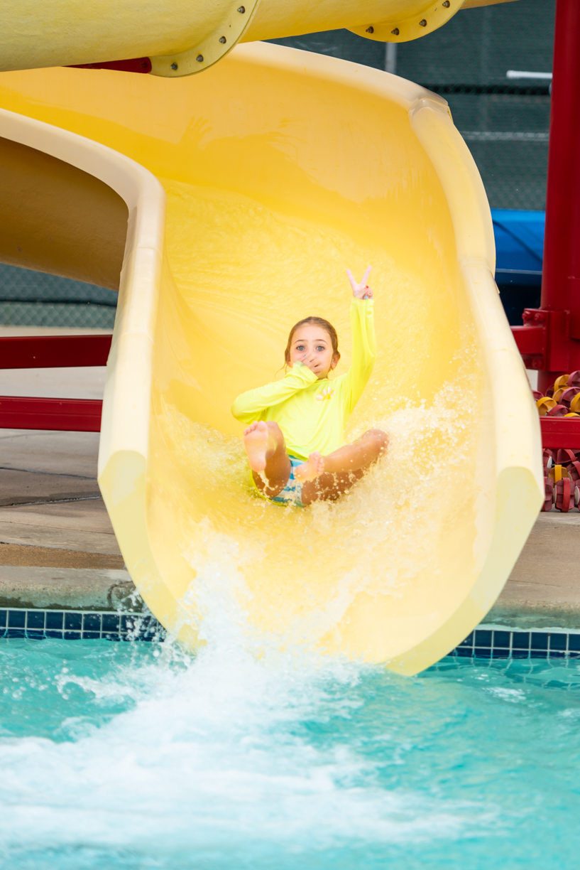 kid on water slide